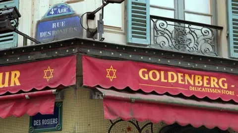 Accused in 1982 assault on Kosher eatery in the City of Light apprehended in West Bank